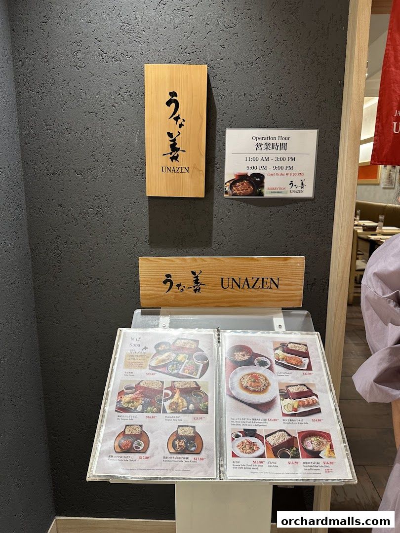 A menu display for Unazen restaurant, showcasing various Japanese dishes with prices.