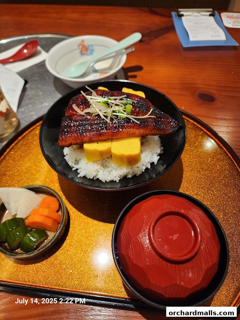 A delicious Unazen eel dish served with rice, pickles, and a side soup.