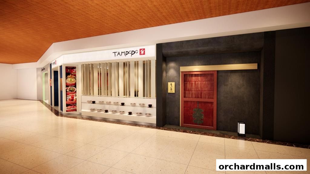 The exterior of a Japanese restaurant with a red sliding door and display of bowls.