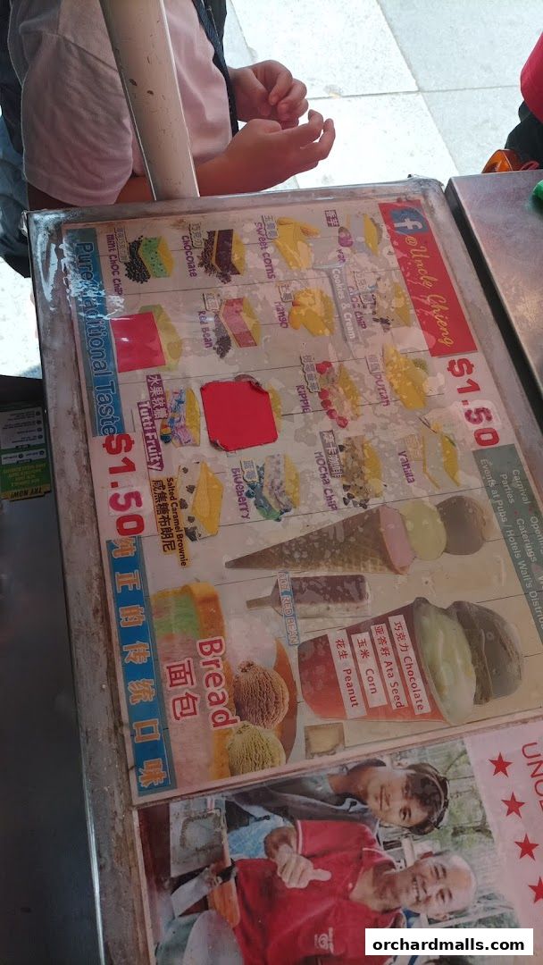 A menu board for Uncle Chieng Traditional Wafer Ice Cream with various flavors and prices.
