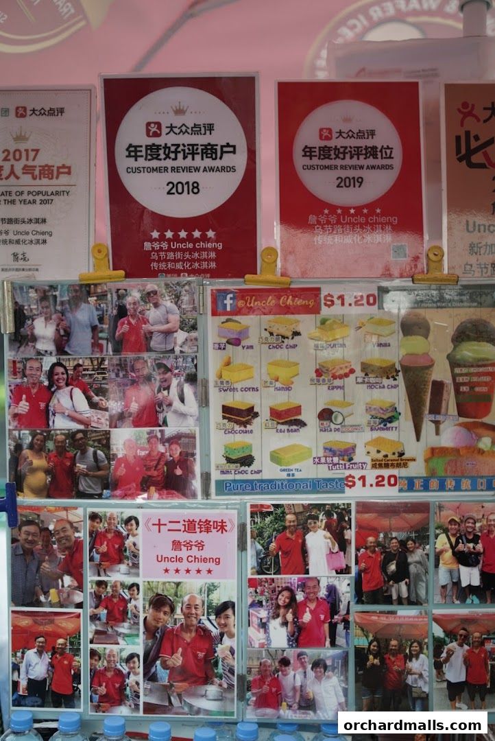 A display board for Uncle Chieng Traditional Wafer Ice Cream, featuring awards and product images.