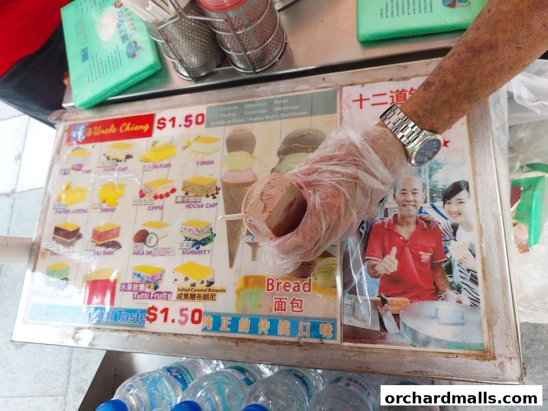 A menu board for Uncle Chieng Traditional Wafer Ice Cream with various flavors and prices.