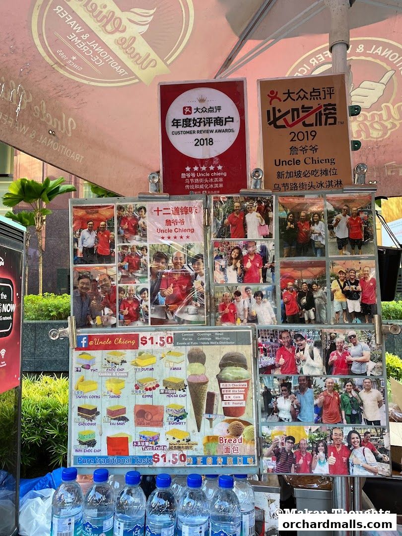 A display board for Uncle Chieng Traditional Wafer Ice Cream with photos and menu items.