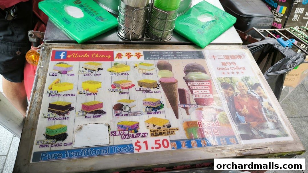 A menu board for Uncle Chieng Traditional Wafer Ice Cream, showcasing various flavors.