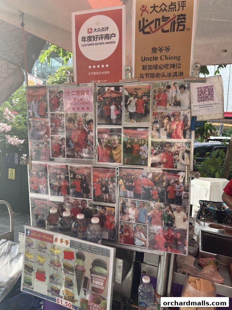 A street stall displaying photos of happy customers and a menu for traditional wafer ice cream.