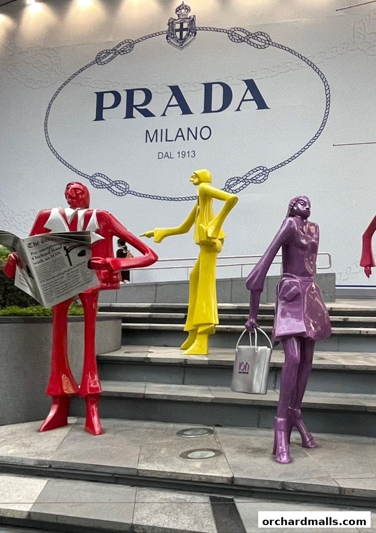 Colorful sculptures in front of a Prada Milano store.