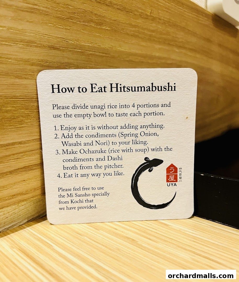 A card explaining how to eat Hitsumabushi with instructions and restaurant logo.