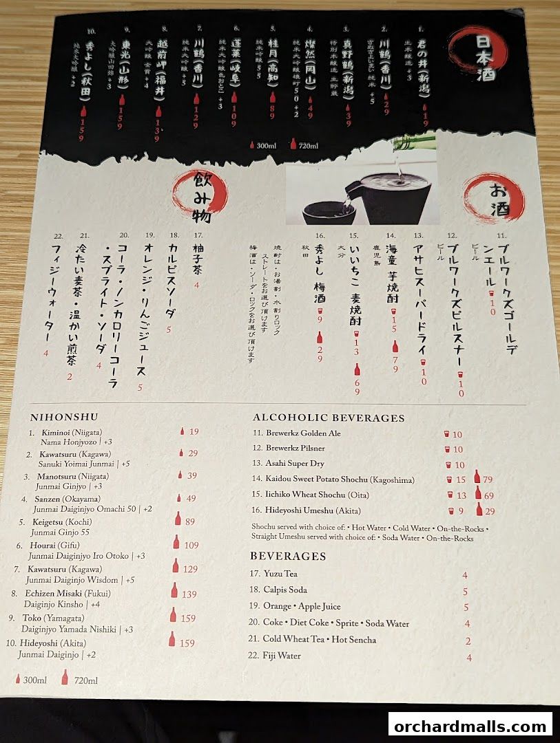 A menu featuring Japanese sake, alcoholic beverages, and other drinks with prices.