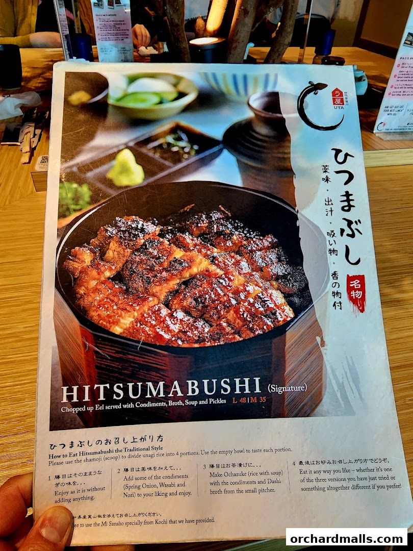 A menu featuring Hitsumabushi, a chopped eel dish with condiments, broth, soup, and pickles.