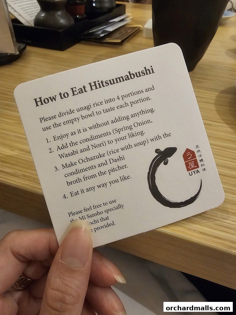 A card explaining how to eat Hitsumabushi at UYA Unagi Singapore.