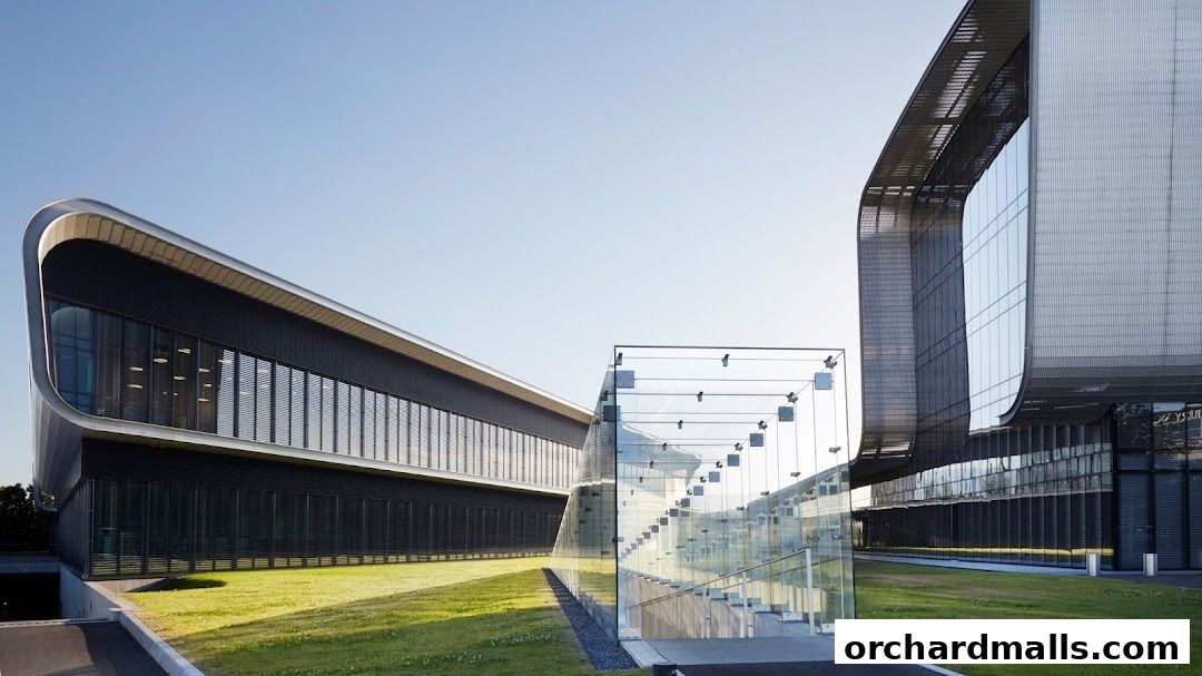 Modern Vacheron Constantin building with glass entrance and curved architecture.