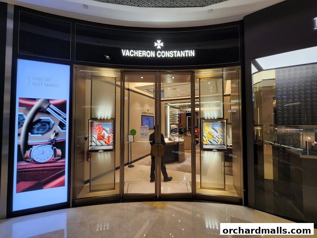 The elegant storefront of Vacheron Constantin, showcasing luxury watches and a sophisticated interior.
