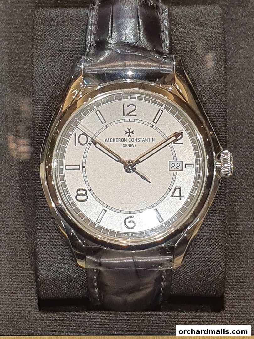 A close-up shot of a Vacheron Constantin watch with a silver dial and black leather strap.