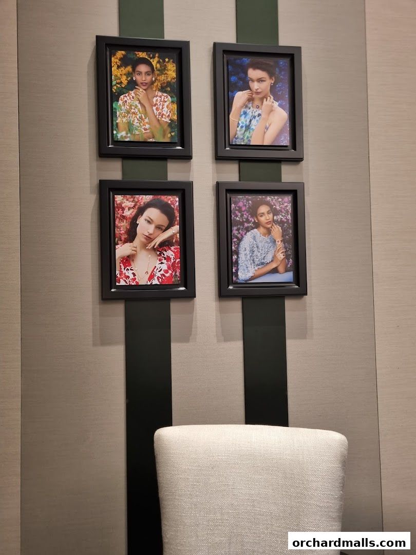 Four framed portraits of models showcasing jewelry against floral backdrops.