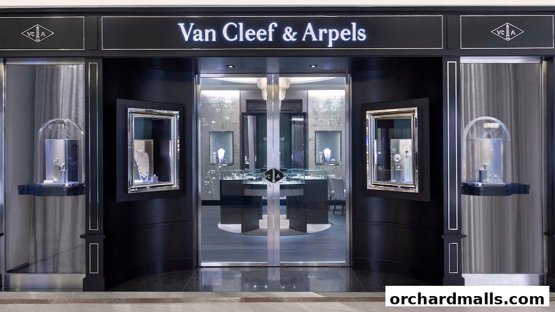 The elegant storefront of Van Cleef & Arpels at Takashimaya Shopping Centre, Singapore.
