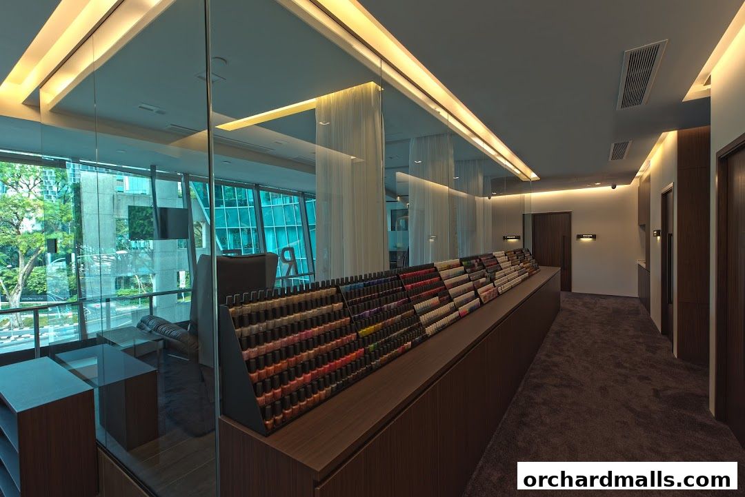 Interior view of a medi-spa with a large display of nail polish colors.