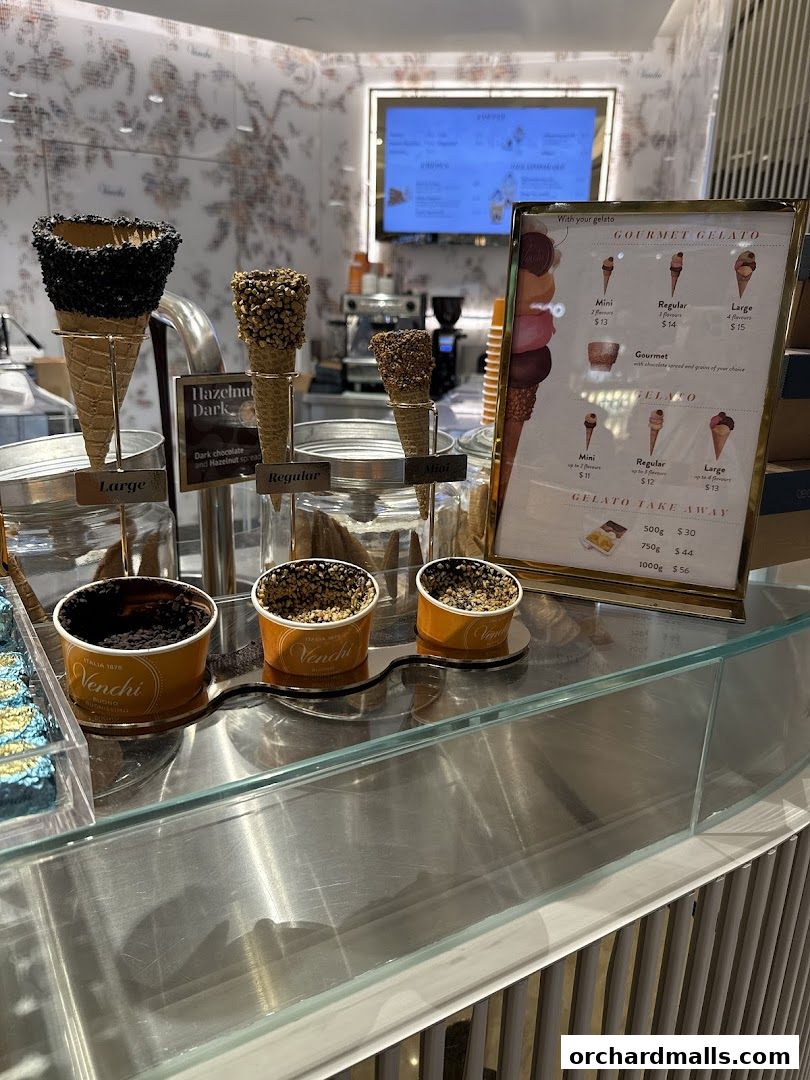 Venchi Singapore ION Orchard Store displays gourmet gelato cones and take-away options.