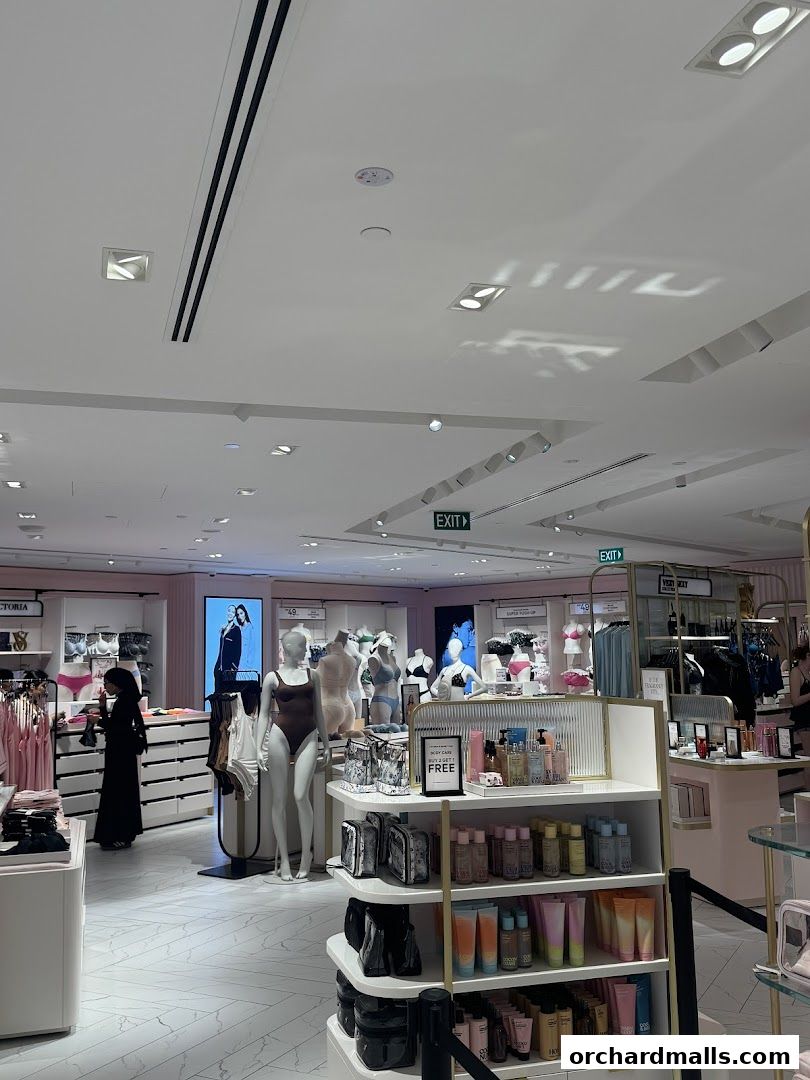 Interior view of a Victoria's Secret store showcasing lingerie, beauty products, and mannequins.