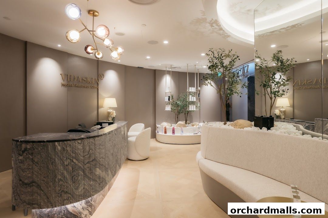 Interior of VIDASKIN Medical Aesthetic Clinic with a reception desk, seating, and product displays.