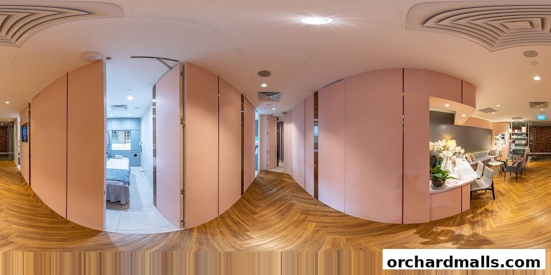 Interior view of a modern medical aesthetic clinic with treatment rooms and a reception area.