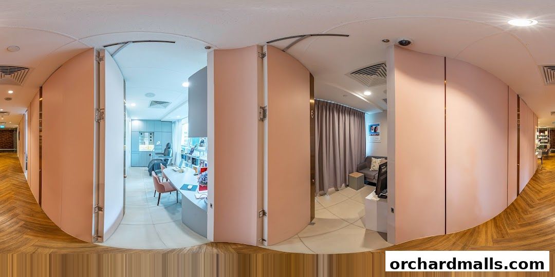 Interior view of a modern medical aesthetic clinic with treatment rooms and a reception area.