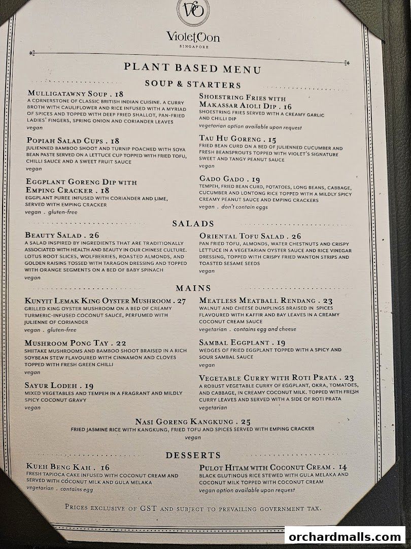 A plant-based menu from Violet Oon Singapore featuring soups, starters, salads, mains, and desserts.