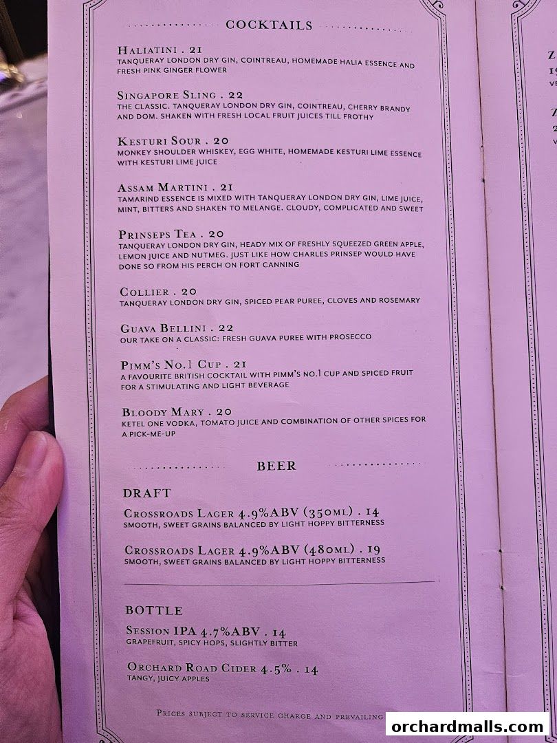 A menu featuring cocktails and beers with descriptions and prices.