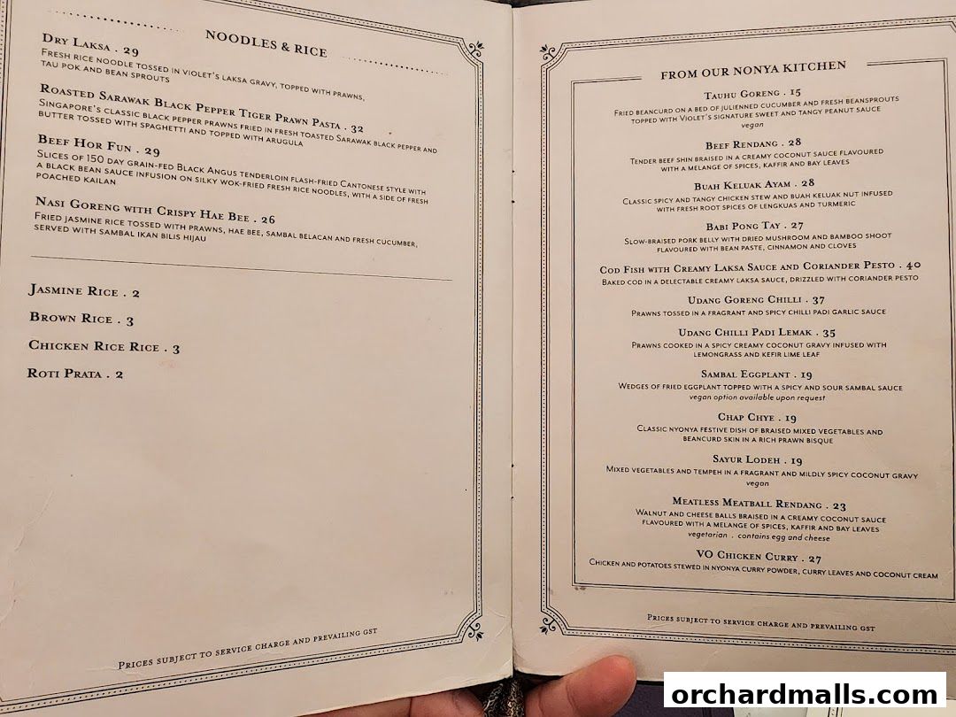 A menu from Violet Oon at ION Orchard featuring Noodles & Rice and From Our Nonya Kitchen sections.