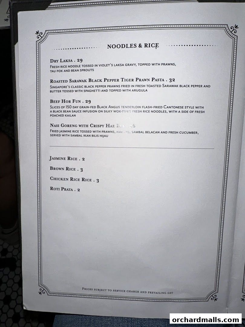 A menu page from Violet Oon at ION Orchard featuring noodles and rice dishes.