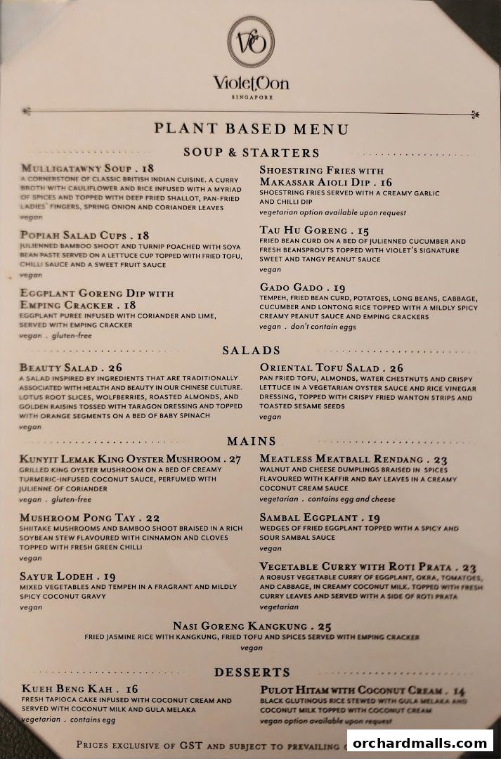 A plant-based menu from Violet Oon Singapore featuring soups, starters, salads, mains, and desserts.