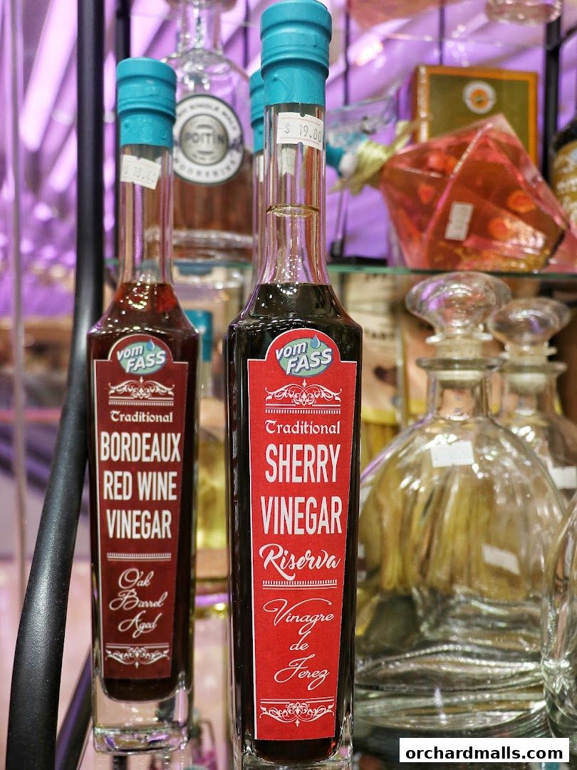 Close-up of two bottles of Vom Fass vinegar, one Bordeaux Red Wine Vinegar and one Sherry Vinegar.