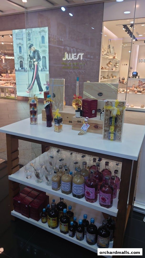 A display of bottled spirits and gift sets from Vom Fass ION.