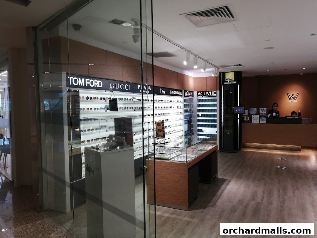 Interior view of W Optics, showcasing a wide selection of designer eyewear and contact lenses.