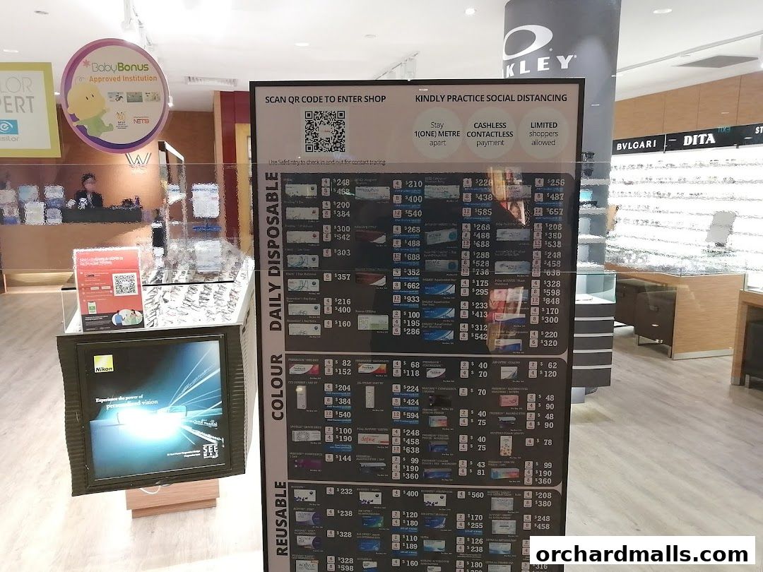 A price list for contact lenses displayed at W Optics, with categories for daily disposable and reusable lenses.