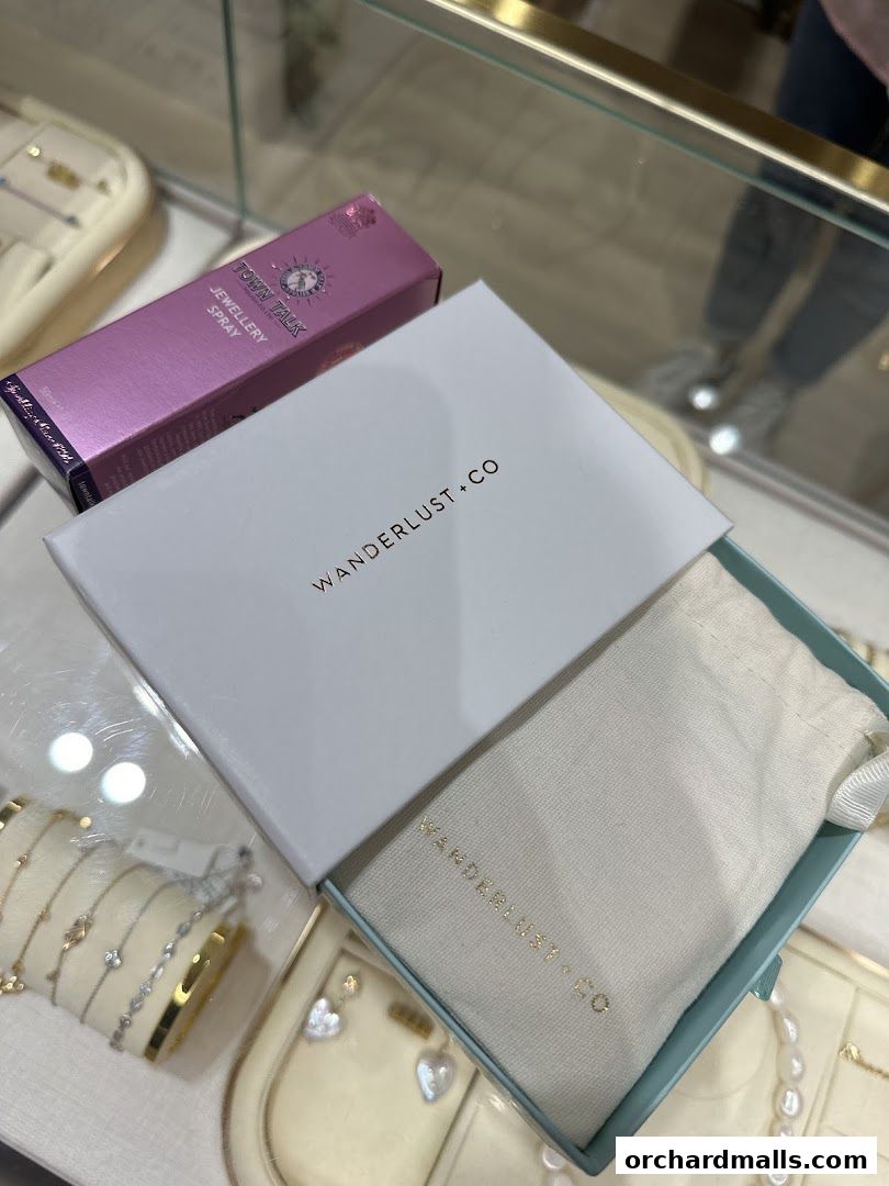 Wanderlust & Co jewellery box and spray on display in a store.