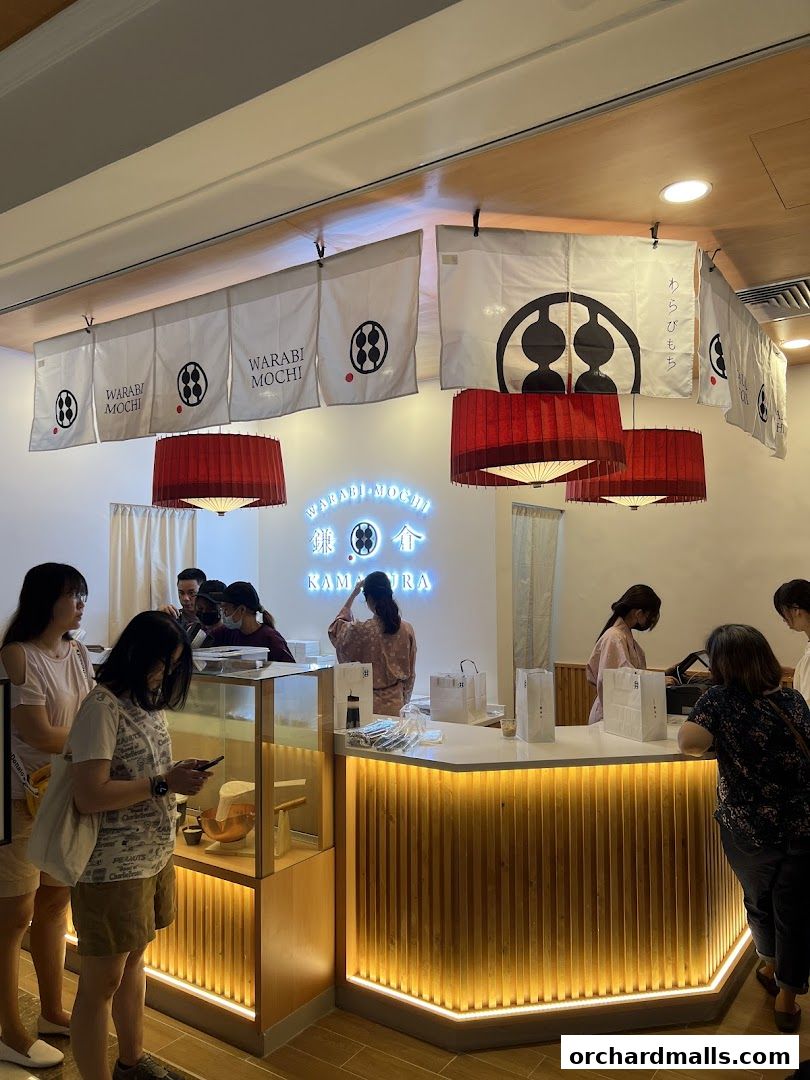 Customers queue at the counter of Warabimochi Kamakura, a dessert shop.