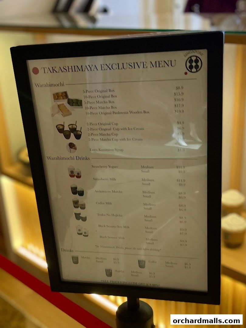 A menu board for Warabimochi Kamakura, featuring various mochi and drink options.