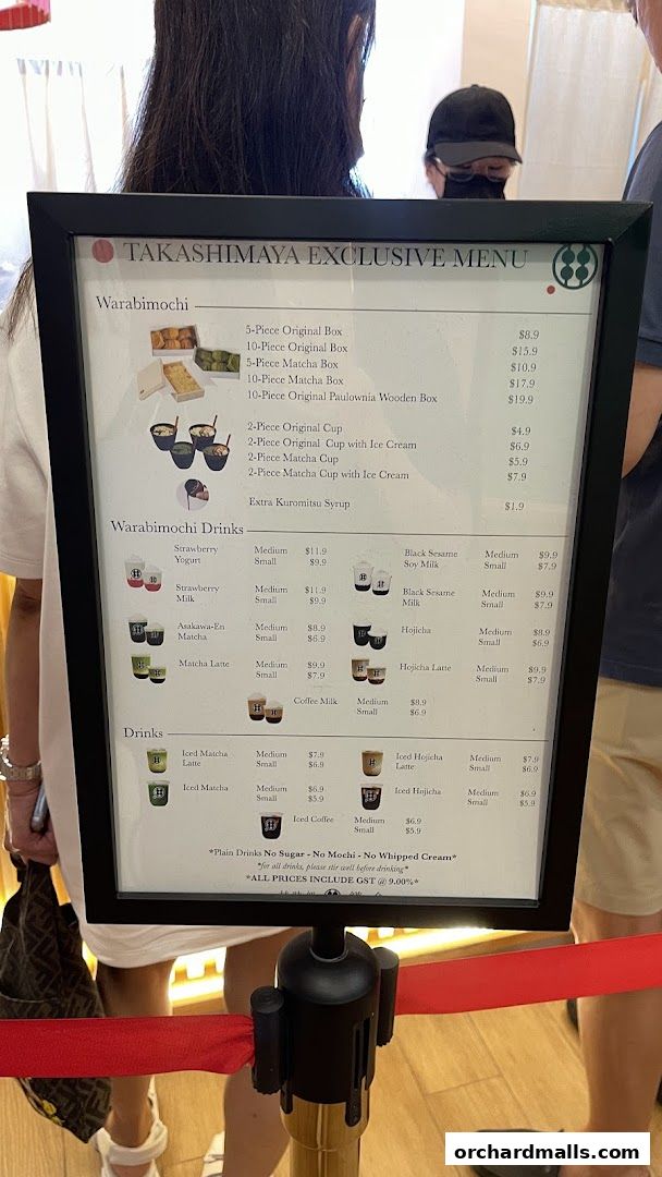 A menu board for Warabimochi Kamakura, featuring various mochi and drink options with prices.