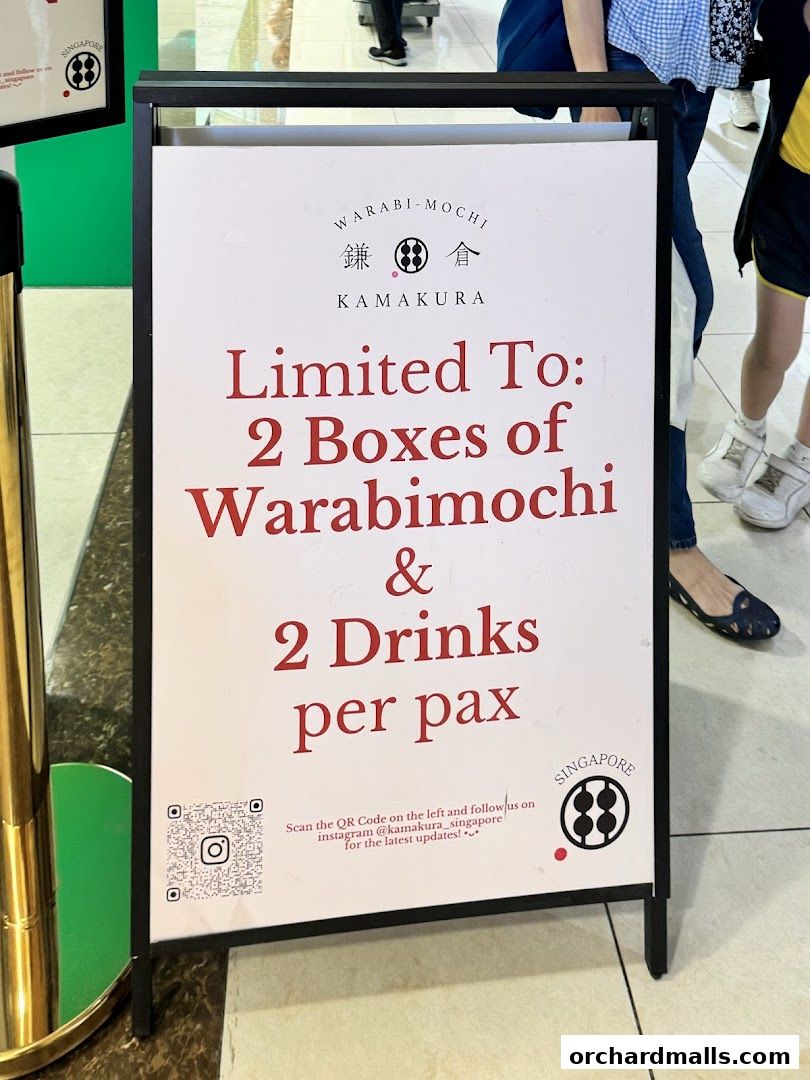 A sign displays a purchase limit of 2 boxes of warabimochi and 2 drinks per person.