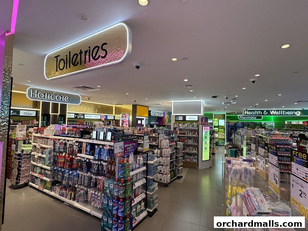 Interior view of a Watsons pharmacy with aisles of toiletries, haircare, and health products.