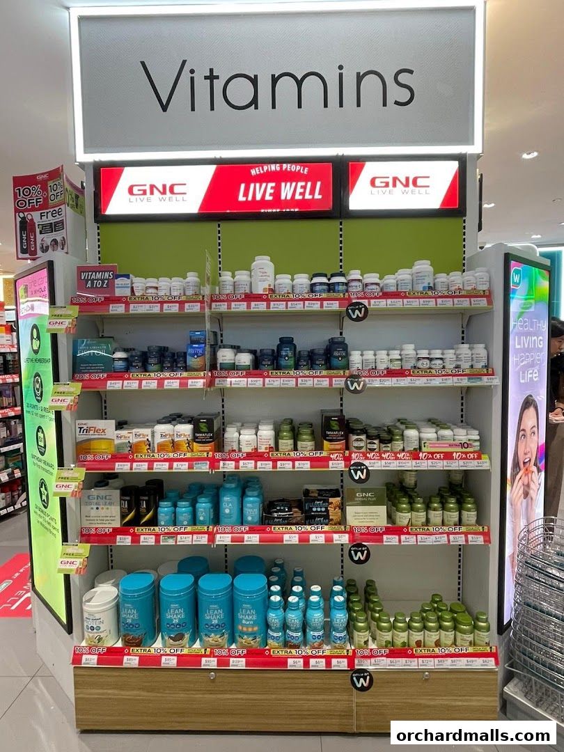 A display of various vitamins and health supplements from GNC at Watsons.
