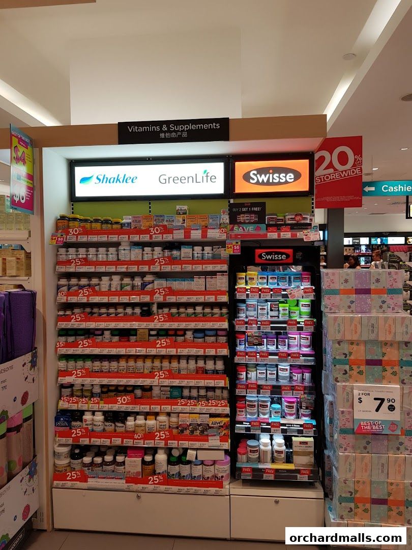 A display of vitamins and supplements with various brands and discounts.