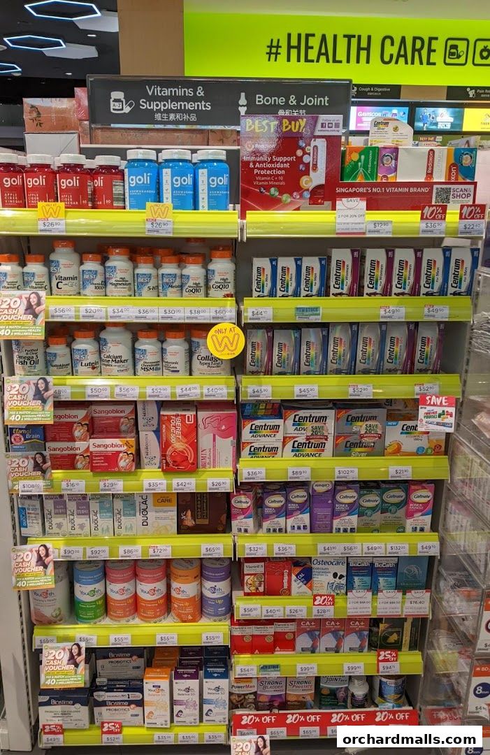 A wide selection of vitamins, supplements, and health products displayed on shelves in a retail store.