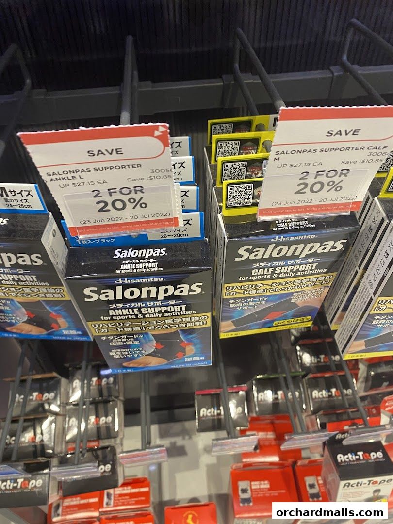 Shelves stocked with Salonpas ankle and calf supporters, featuring a '2 for 20%' sale.