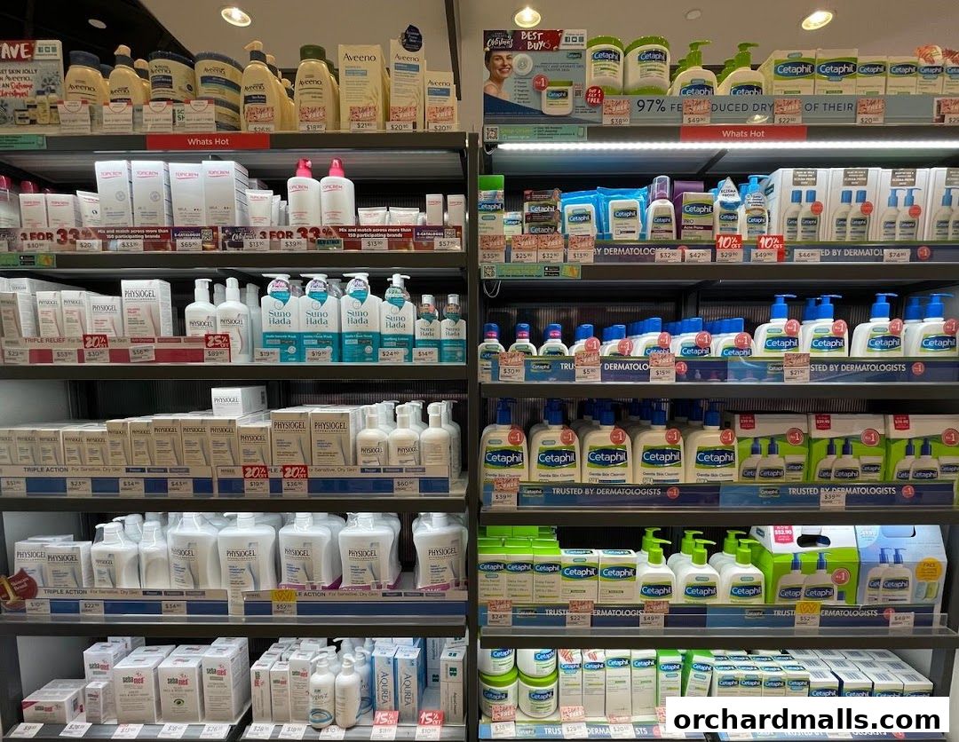 Shelves stocked with various skincare products, including Cetaphil and Physiogel brands.