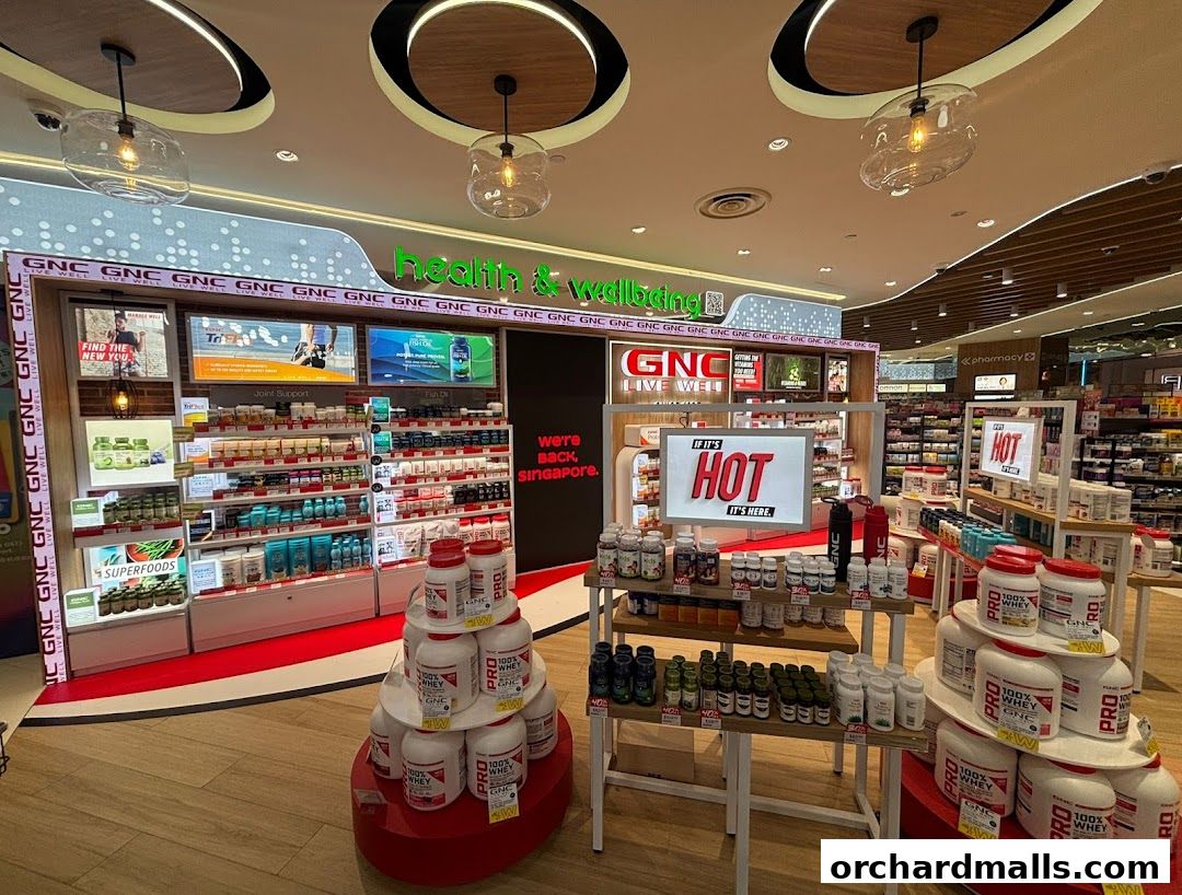 Interior view of a Watsons pharmacy and GNC store, showcasing health and wellness products.
