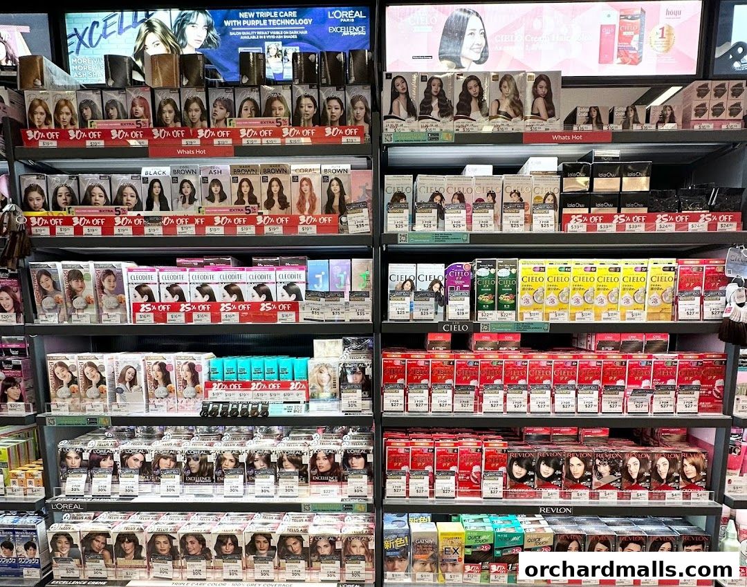 Shelves stocked with various hair dye products from brands like L'Oréal, Revlon, and Cielo.