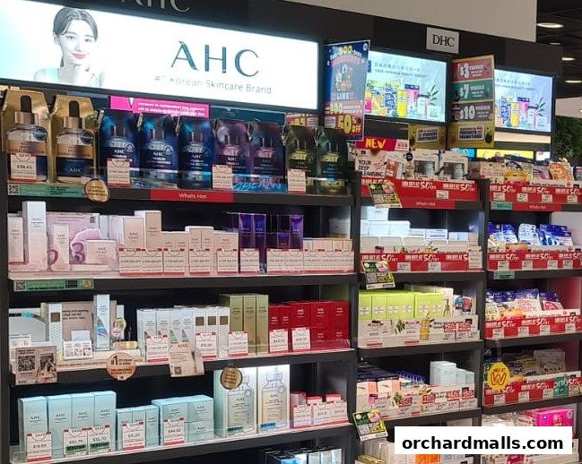 Shelves stocked with Korean skincare products from AHC and other brands.