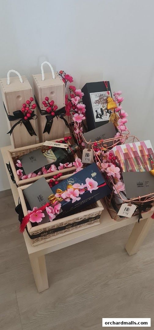 Gift baskets filled with wine bottles, spirits, and decorative items.