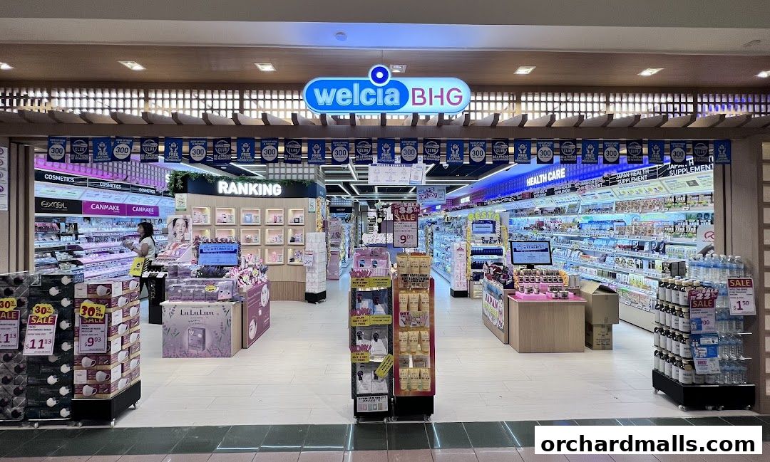 The entrance of Welcia BHG, a well-stocked health and beauty store with various products on display.